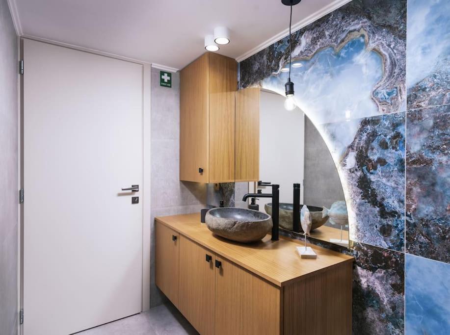In The Hill Apartment Moirai